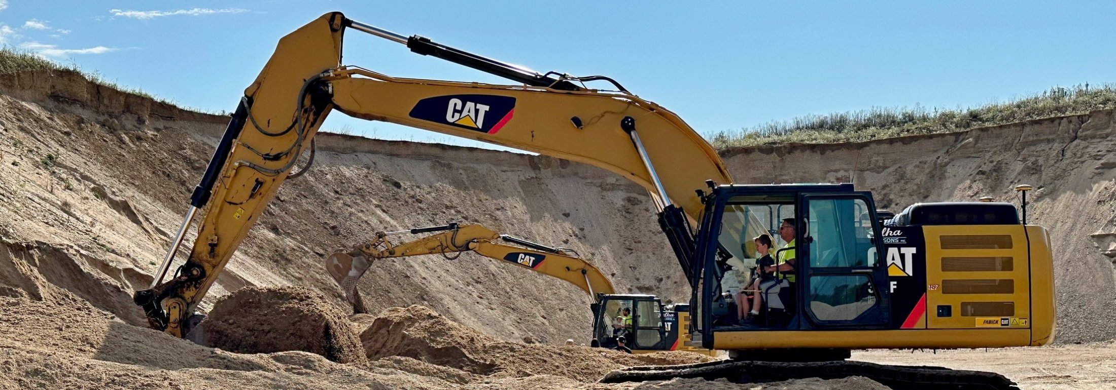 OPERATE A BACKHOE IN OUR SAND BOX!